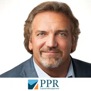 executive search recruitment appointment professional headshot of PPR CEO smiling wearing a suit