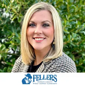 executive search recruitment Haley Wright's professional headshot in front of a wall of bushes outdoors in the sunshine